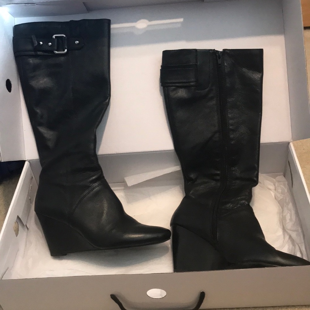 Black leather wedge boots